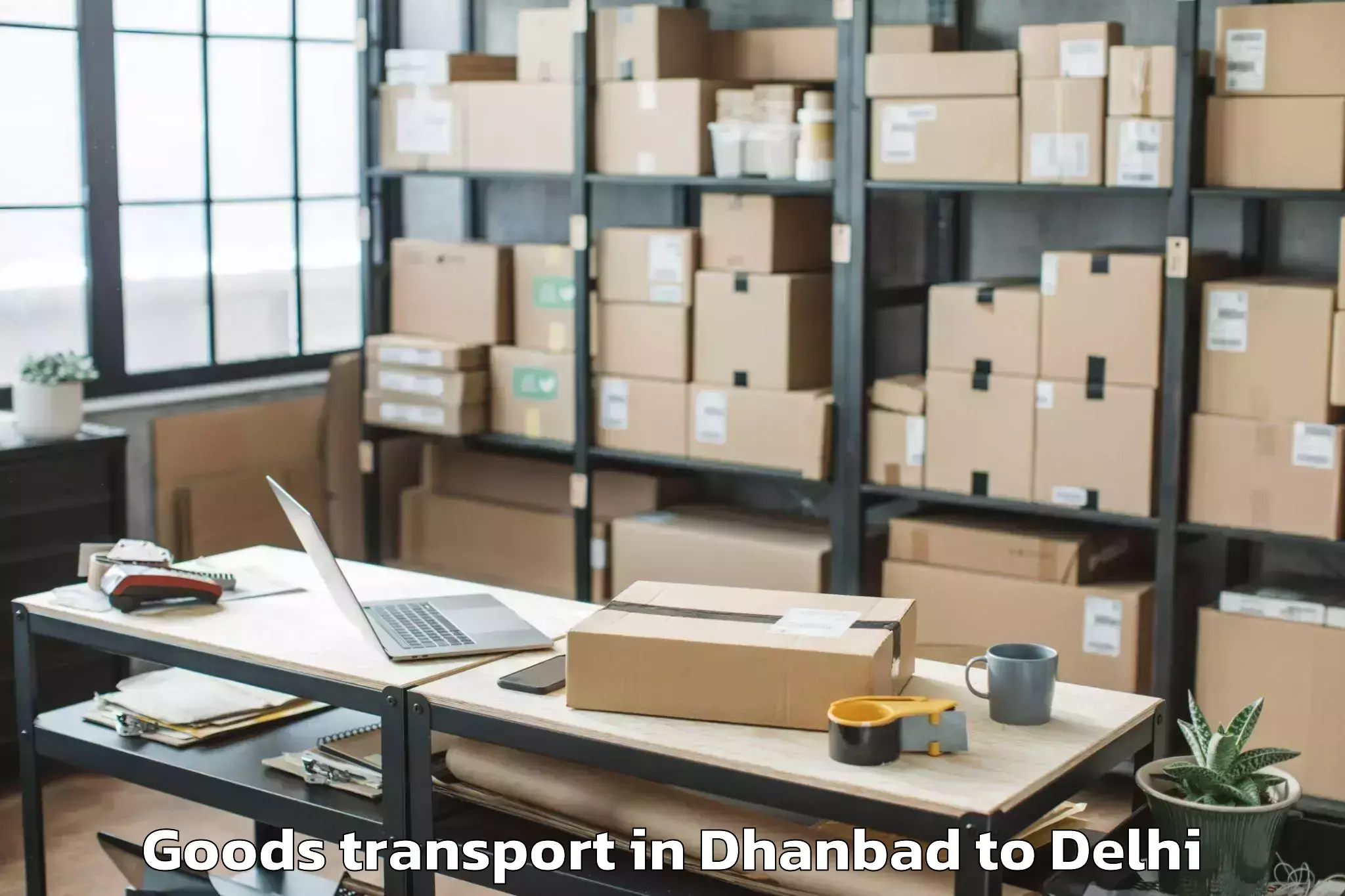 Professional Dhanbad to University Of Delhi Goods Transport